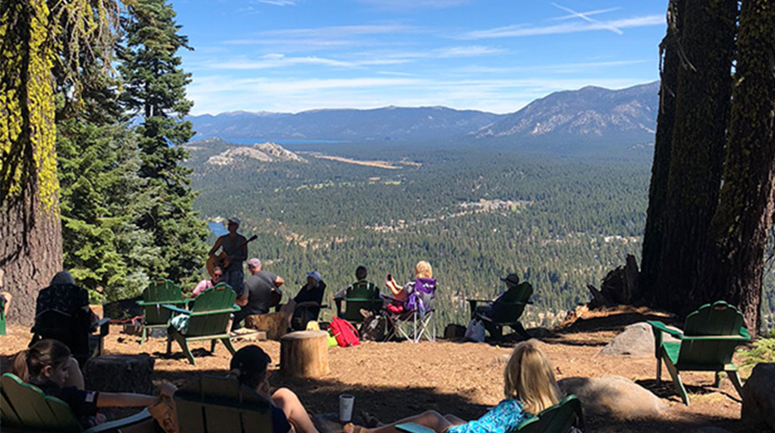 Echo Lake campers on chairs overlooking view