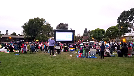 People watching movie in the park
