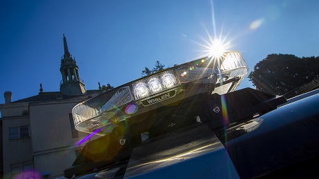 Police headlights on a sunny day