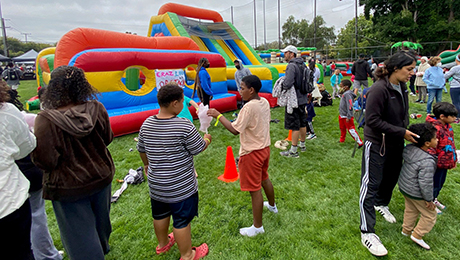 Community Picnic event with bounce house