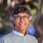 Smiling man with glasses