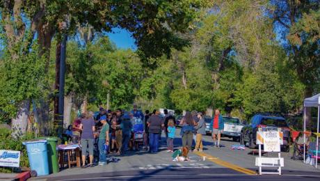 Neighbors gather on street for National Night Out. 