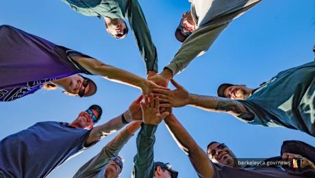 Group of people stack hands