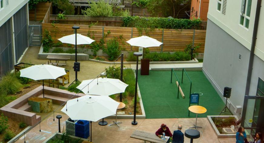 Courtyard with play areas for different age children