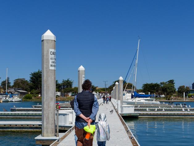 People walking the brand new D&amp;E Docks at the Waterfront
