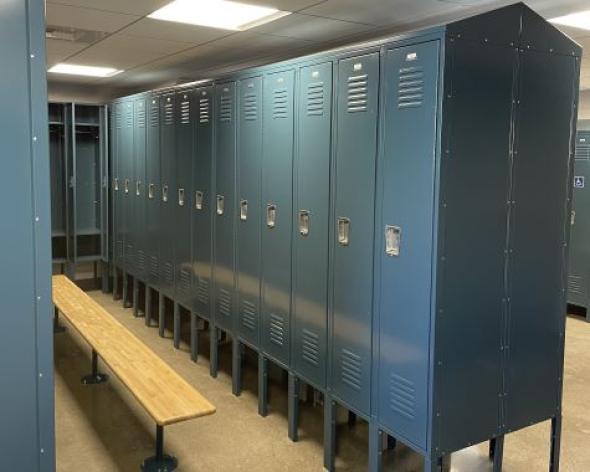 New lockers and bench in renovated locker room at the corporation yard